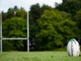 Set of Rugby posts and a rugby ball on a pitch in Bradford